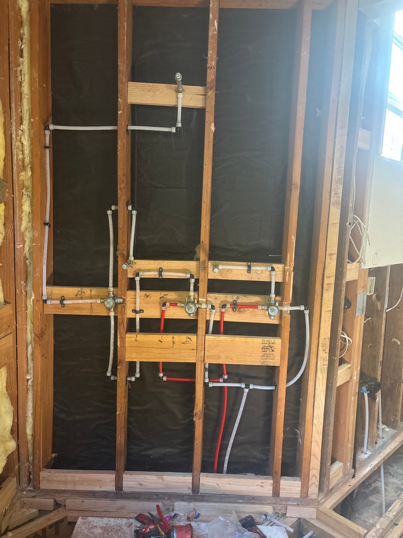 PEX manifold rough-in plumbing